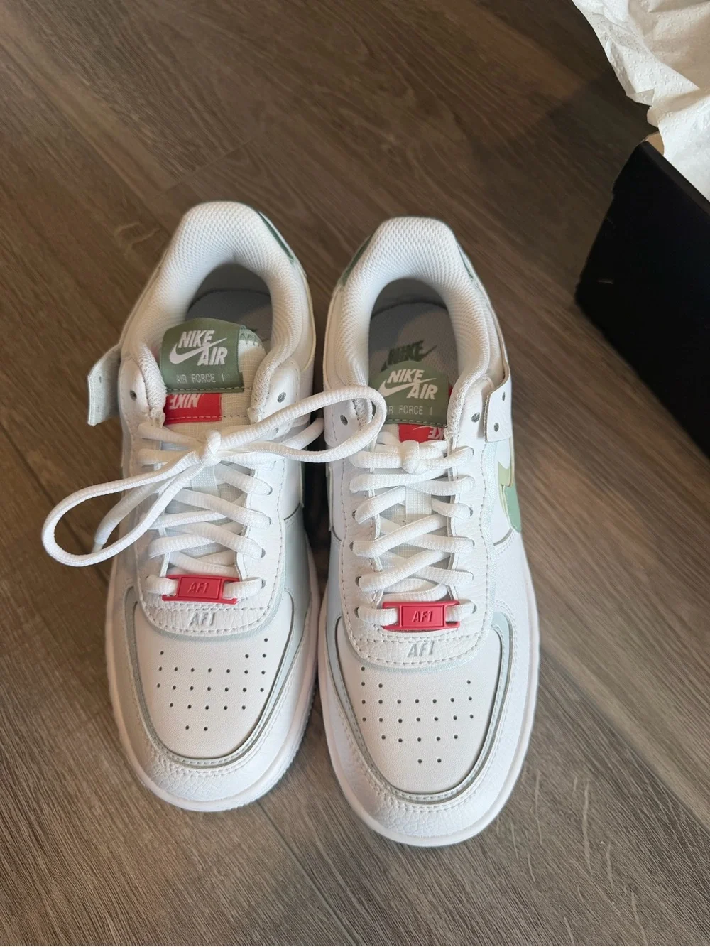 Nike Kids White Sneakers with Sage Green and Pink Accents
